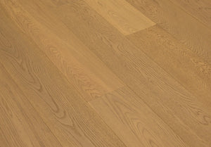 A picture of Naples hardwood from the Wildwood Nature collection. The hardwood is a light beige-caramel colour and there are little to no knots or minor variations in the hardwood, due to the high grade of wood.