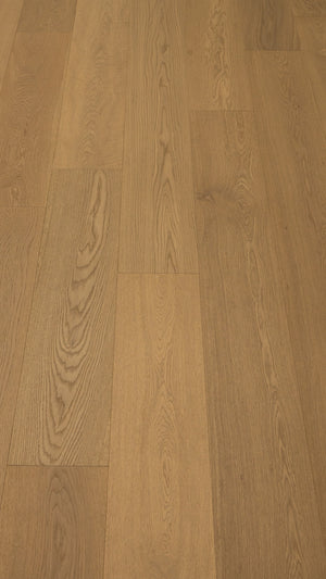 A picture of Naples hardwood from the Wildwood Nature collection. The hardwood is a light beige-caramel colour and there are little to no knots or minor variations in the hardwood, due to the high grade of wood.