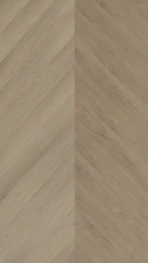 A picture showing the 6.5mm lvp flooring called Saigon in the chevron pattern. This vinyl floor is uniquely crafted and can only be installed in the chevron pattern. It has a light medium beige hue and silver chain embossing, giving the floor an ultra-realistic look.