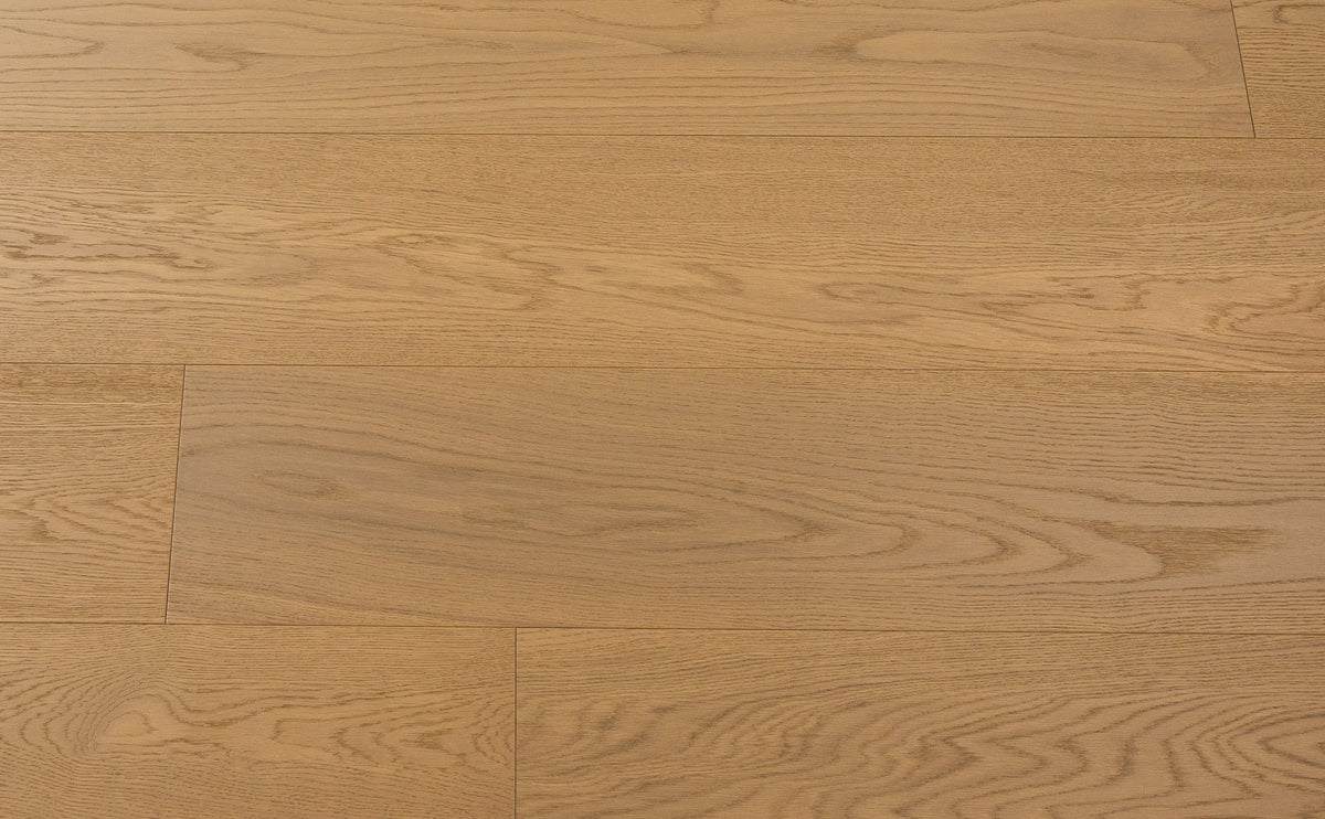 A picture of Naples hardwood from the Wildwood Nature collection. The hardwood is a light beige-caramel colour and there are little to no knots or minor variations in the hardwood, due to the high grade of wood.