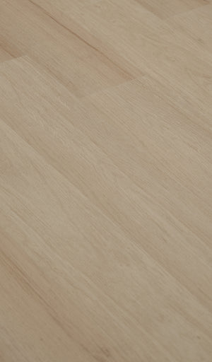 A picture showing the 6.5mm lvp flooring called Pompeii. It has a light medium beige hue and silver chain embossing, giving the floor an ultra-realistic look.