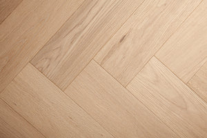 A picture of Arvand herringbone hardwood, showing minimal variation and the clean look of this hardwood.