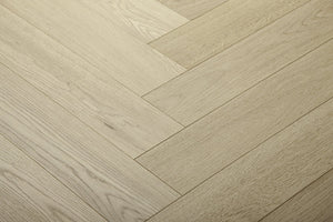 A picture of Arvand herringbone hardwood, showing minimal variation and the clean look of this hardwood.