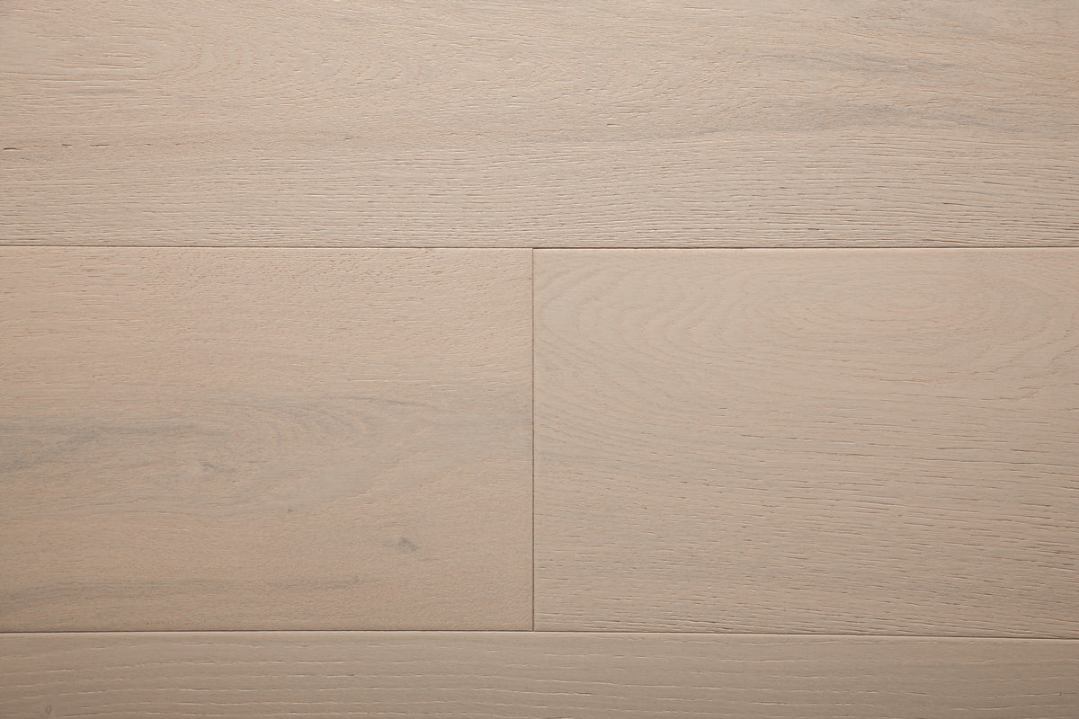 A picture of the oak  hardwood flooring called Florence from the Wildwood Antique Collection, showing some minor knots and variation with a light, white-washed hue.