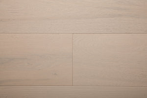 A picture of the oak  hardwood flooring called Florence from the Wildwood Antique Collection, showing some minor knots and variation with a light, white-washed hue.